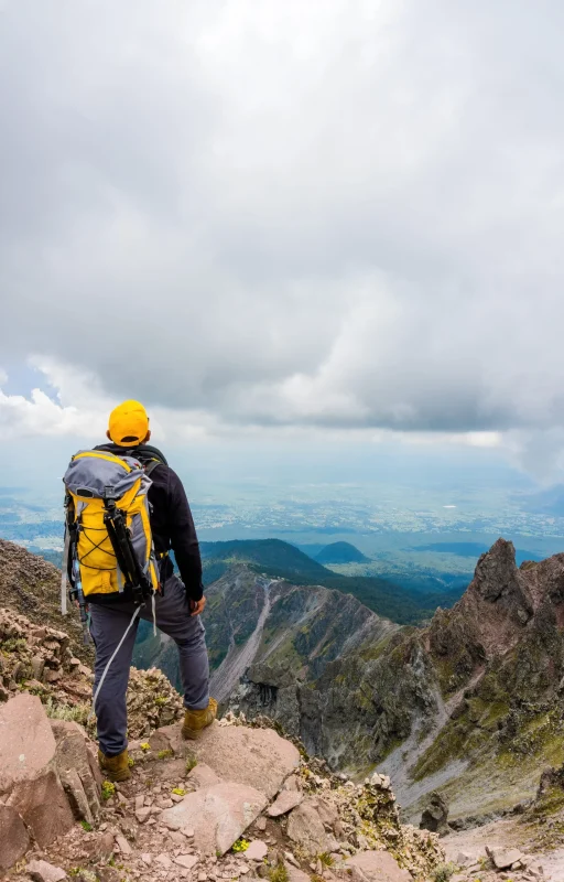 hiker-with-backpack-standing-top-mountain-_1_